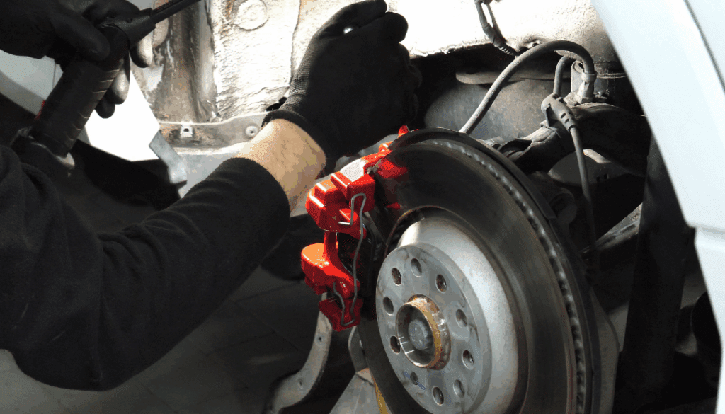 car-on-lift-brake-rotor-inspection-birmingham